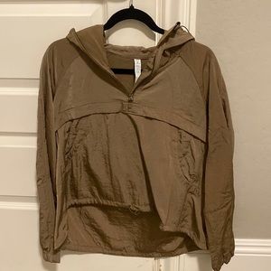 Lululemon brown, xs/s raincoat. Jacket was never worn and in great condition.
